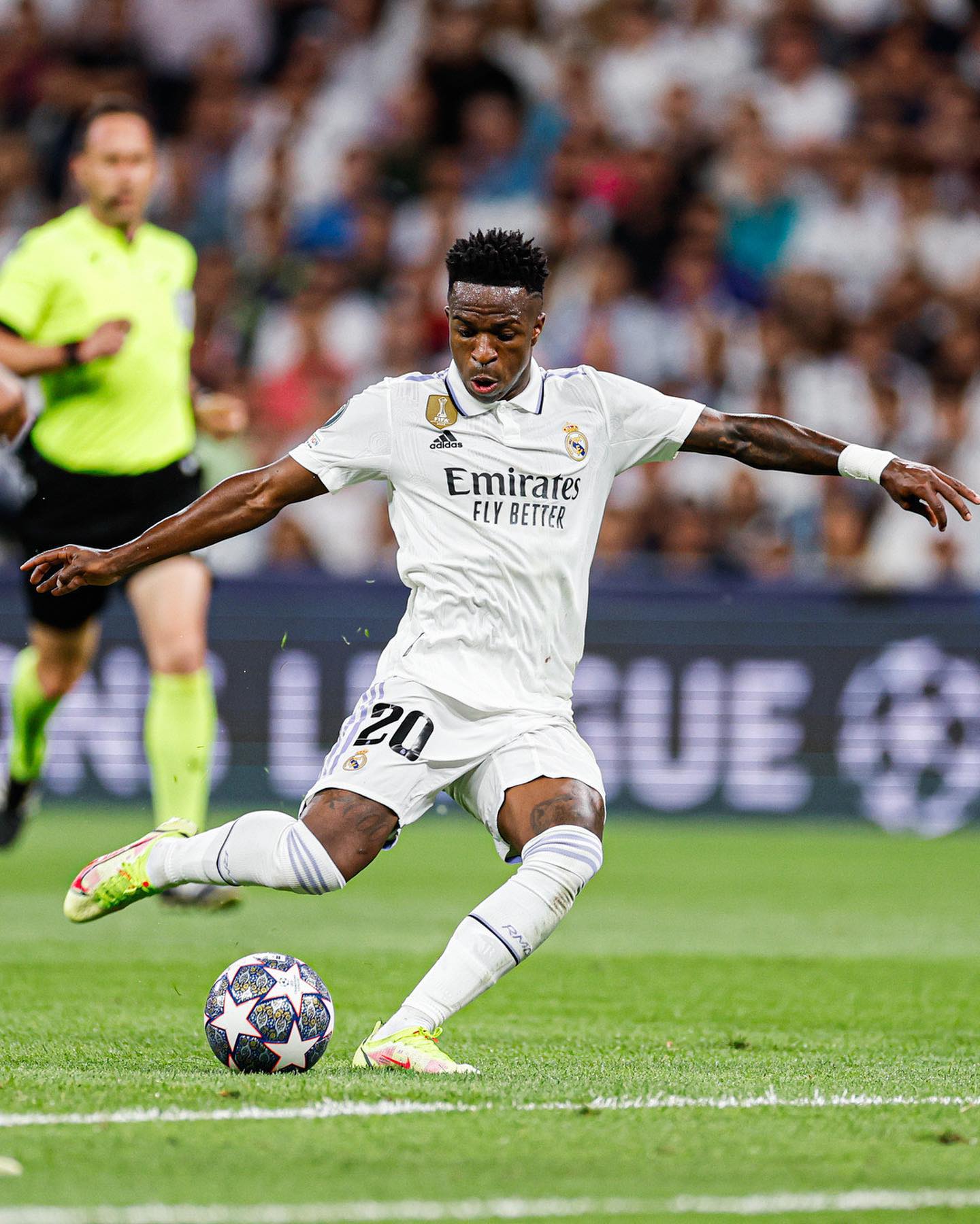 Vinícius Jr. kicking a soccer ball playing in a game for Real Madrid